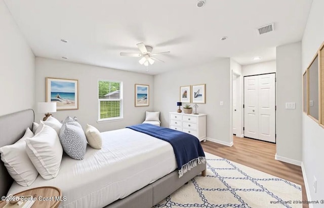 1011 Webster Rd SE, Palm Bay, FL 32909 - bedroom with light wood finished floors, recessed lighting, and a ceiling fan