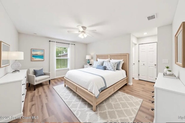 1011 Webster Rd SE, Palm Bay, FL 32909 - bedroom with light wood-style floors, recessed lighting, and ceiling fan