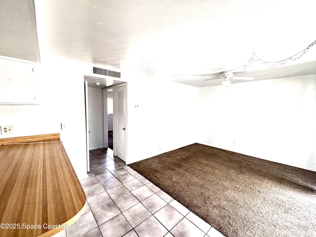 1721 Dixon Blvd Unit 36, Cocoa, FL 32922 - unfurnished room featuring a ceiling fan and light tile patterned floors