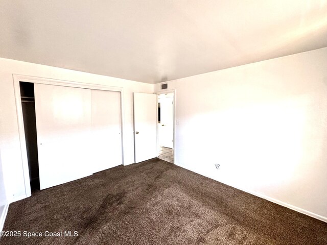 1721 Dixon Blvd Unit 36, Cocoa, FL 32922 - unfurnished bedroom with carpet flooring and a closet