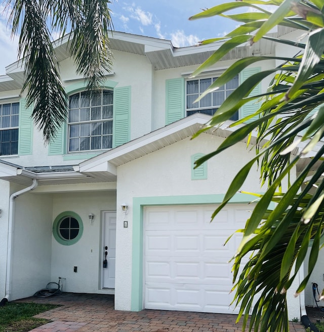 117 Anchorage Ave Unit 6, Cape Canaveral, FL 32920 - view of front facade with stucco siding