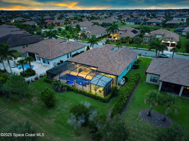 5197 Kirkwall Cir, Melbourne, FL 32940 - aerial view at dusk of a residential view