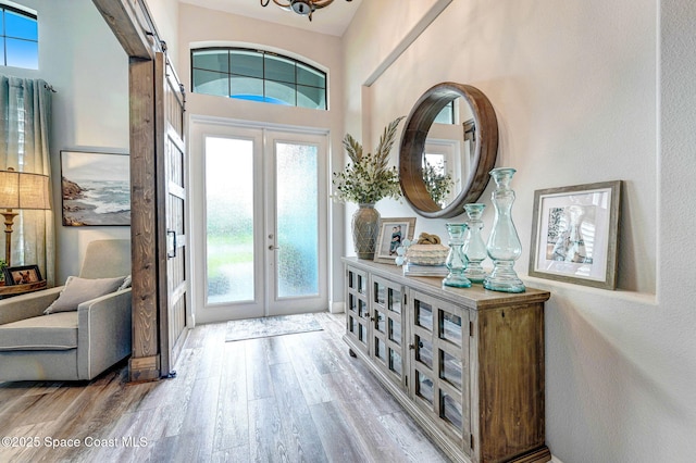 5197 Kirkwall Cir, Melbourne, FL 32940 - foyer entrance with french doors and wood finished floors