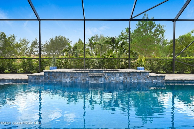 5197 Kirkwall Cir, Melbourne, FL 32940 - outdoor pool featuring glass enclosure and a hot tub