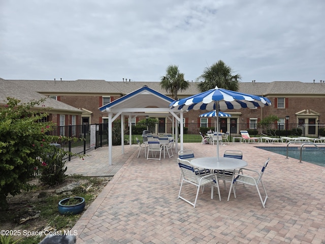 152 E Colonial Ct Unit 84, Indian Harbour Beach, FL 32937 - view of patio / terrace featuring outdoor dining area