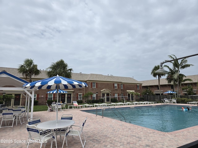 152 E Colonial Ct Unit 84, Indian Harbour Beach, FL 32937 - community pool featuring a patio area