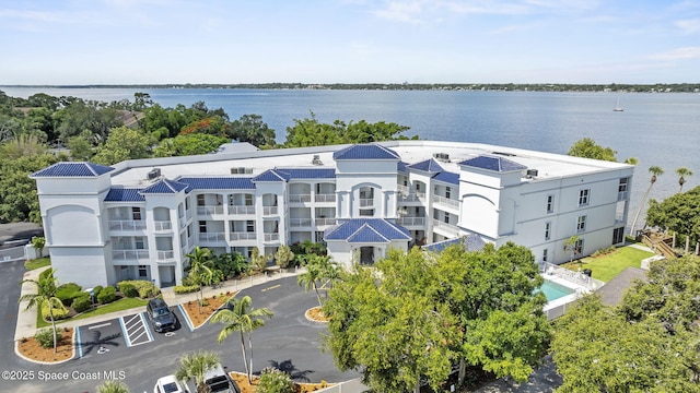 420 Moore Park Ln Unit 203, Merritt Island, FL 32952 - drone / aerial view of a nearby body of water and apartment complex / building