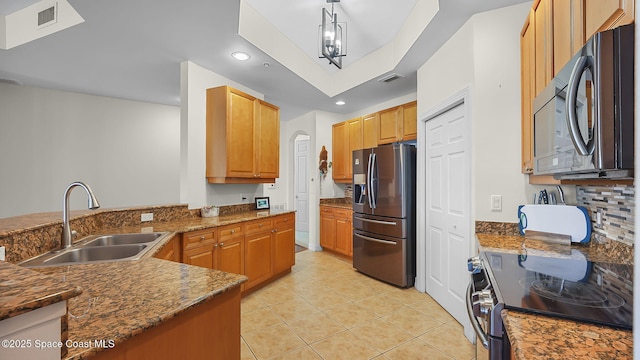 420 Moore Park Ln Unit 203, Merritt Island, FL 32952 - kitchen featuring stainless steel fridge with ice dispenser, range with electric cooktop, light tile patterned floors, recessed lighting, and hanging light fixtures