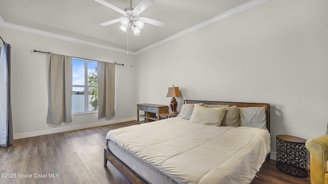 420 Moore Park Ln Unit 203, Merritt Island, FL 32952 - bedroom featuring wood finished floors, crown molding, and ceiling fan