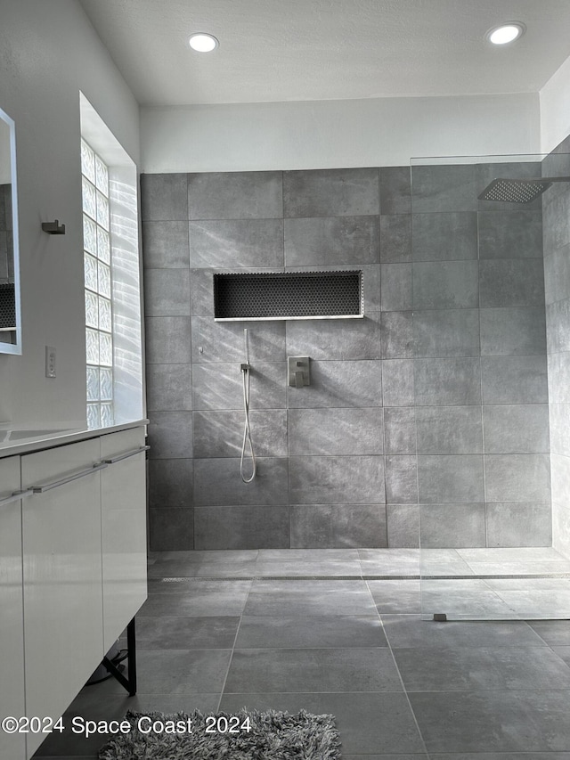 184 Calico Ln, Indialantic, FL 32903 - bathroom featuring walk in shower, vanity, and recessed lighting
