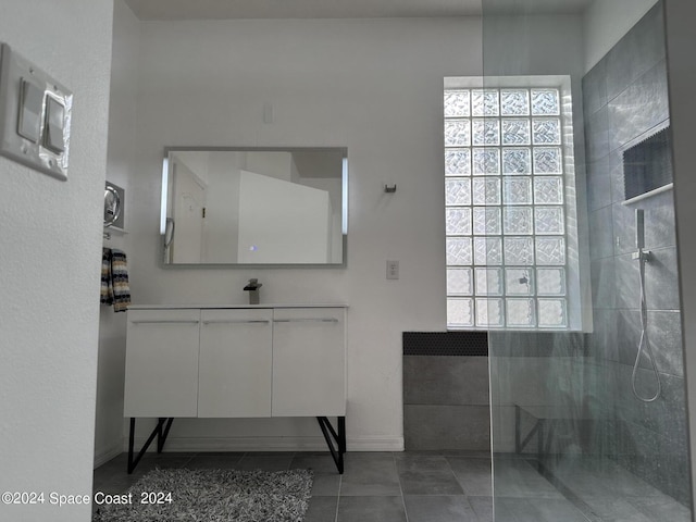 184 Calico Ln, Indialantic, FL 32903 - full bath with walk in shower, vanity, and tile patterned floors