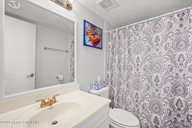 1611 Minutemen Cswy Unit 107-Hh, Cocoa Beach, FL 32931 - full bath with a textured ceiling, vanity, and a shower with curtain