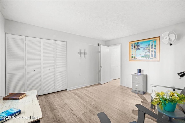 1611 Minutemen Cswy Unit 107-Hh, Cocoa Beach, FL 32931 - office with wood finished floors and a textured ceiling