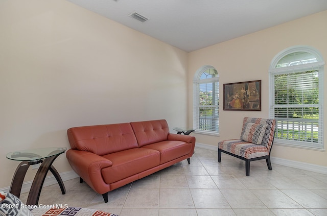 2351 Stonebridge Dr, Rockledge, FL 32955 - living area featuring baseboards and light tile patterned floors