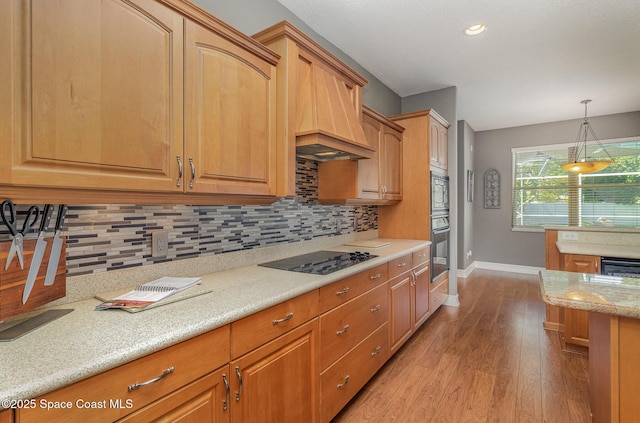 2351 Stonebridge Dr, Rockledge, FL 32955 - kitchen with black appliances, light wood-style floors, tasteful backsplash, pendant lighting, and recessed lighting