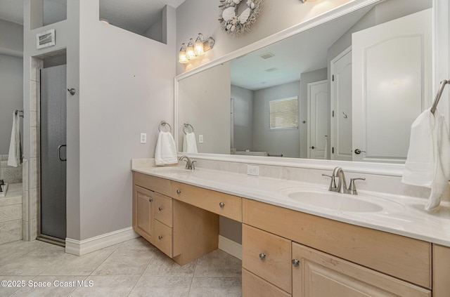 2351 Stonebridge Dr, Rockledge, FL 32955 - bathroom with double vanity, tile patterned flooring, and a shower stall