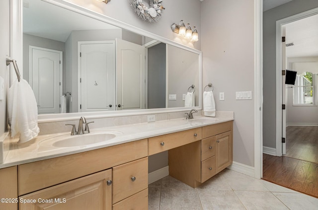 2351 Stonebridge Dr, Rockledge, FL 32955 - full bath featuring double vanity and tile patterned flooring