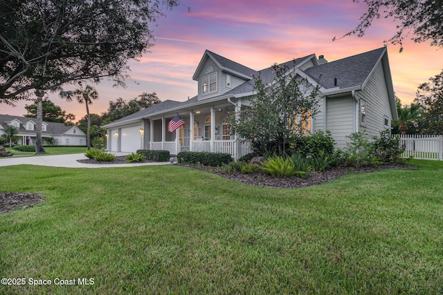 2351 Stonebridge Dr, Rockledge, FL 32955 - view of front of home with covered porch, a garage, concrete driveway, and a shingled roof