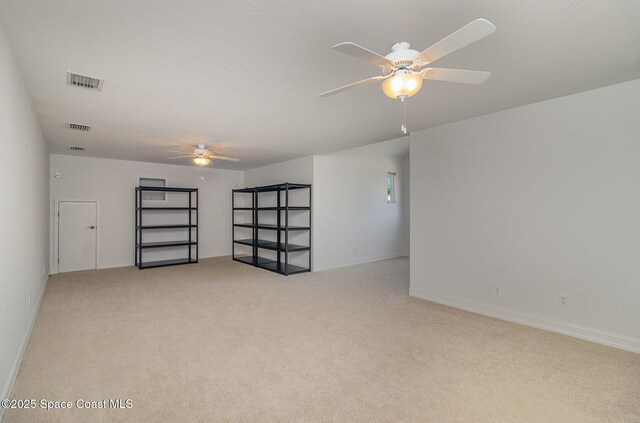 2351 Stonebridge Dr, Rockledge, FL 32955 - empty room with ceiling fan and light carpet