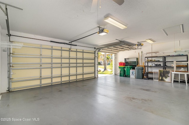 2351 Stonebridge Dr, Rockledge, FL 32955 - garage featuring a garage door opener and ceiling fan