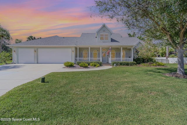 2351 Stonebridge Dr, Rockledge, FL 32955 - view of front facade with a porch, a garage, concrete driveway, and a shingled roof