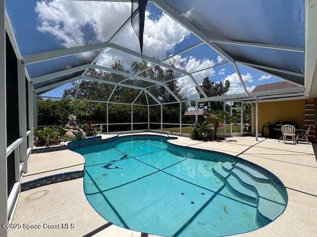 961 Haas Ave NE, Palm Bay, FL 32907 - swimming pool featuring a patio area