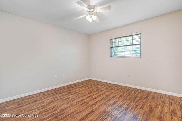 1081 Sunswept Rd NE, Palm Bay, FL 32905 - empty room featuring wood finished floors and ceiling fan