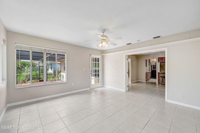 1081 Sunswept Rd NE, Palm Bay, FL 32905 - empty room with ceiling fan and light tile patterned flooring