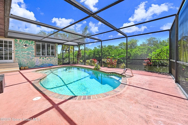 1081 Sunswept Rd NE, Palm Bay, FL 32905 - swimming pool with a patio and glass enclosure
