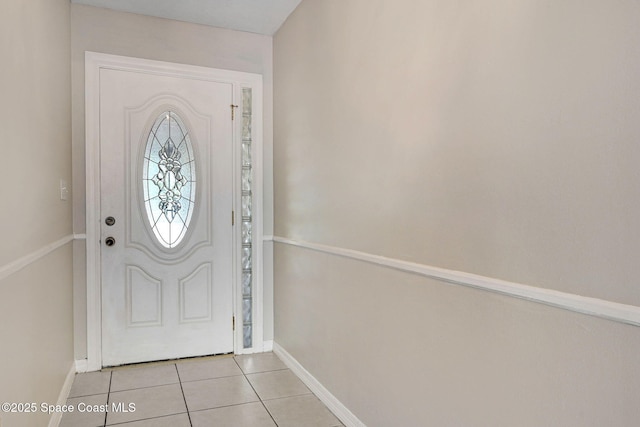 1081 Sunswept Rd NE, Palm Bay, FL 32905 - entrance foyer featuring light tile patterned floors and baseboards