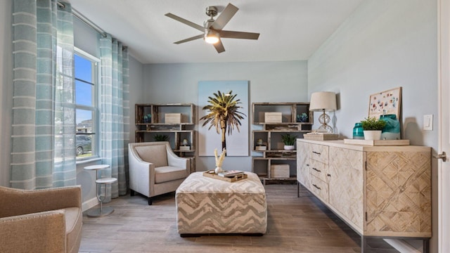 1997 Fuchsia Pl NW, Palm Bay, FL 32907 - sitting room with wood finished floors and a ceiling fan