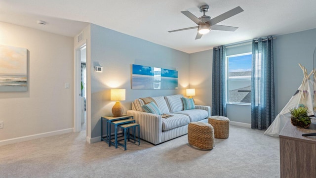 1997 Fuchsia Pl NW, Palm Bay, FL 32907 - carpeted living room with baseboards and ceiling fan