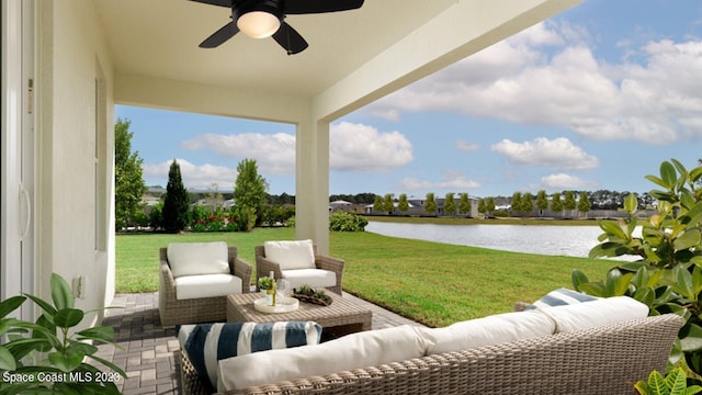 1997 Fuchsia Pl NW, Palm Bay, FL 32907 - view of patio / terrace featuring a water view, a ceiling fan, and an outdoor hangout area