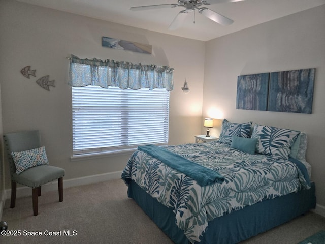 6440 Borasco Dr Unit 2506, Melbourne, FL 32940 - carpeted bedroom featuring baseboards and a ceiling fan