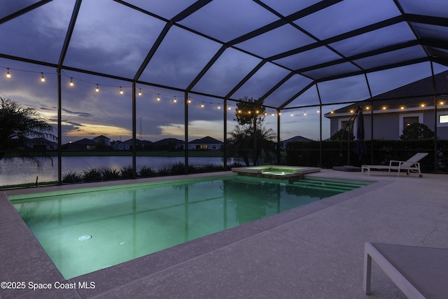 3975 Archdale St, Melbourne, FL 32940 - view of swimming pool with a patio, a pool with connected hot tub, a water view, and a lanai