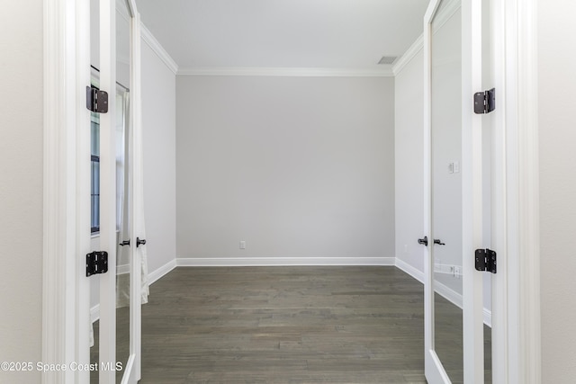 3975 Archdale St, Melbourne, FL 32940 - unfurnished room featuring french doors, ornamental molding, and dark wood-style flooring