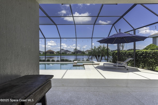 3975 Archdale St, Melbourne, FL 32940 - view of pool with a patio area, a water view, a lanai, and a pool with connected hot tub