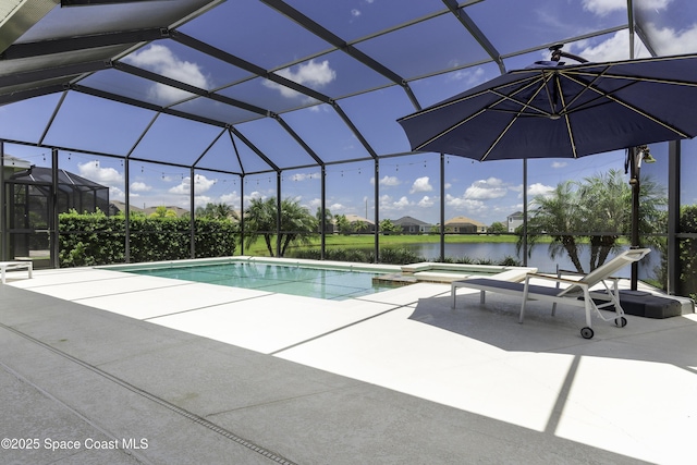 3975 Archdale St, Melbourne, FL 32940 - view of pool with a patio area, a water view, a pool with connected hot tub, and glass enclosure