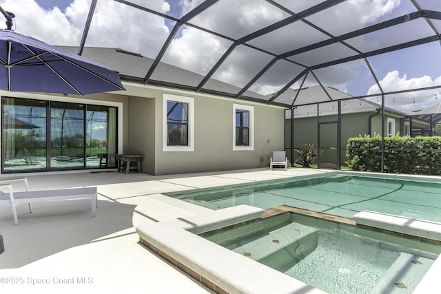 3975 Archdale St, Melbourne, FL 32940 - view of swimming pool with a patio, a pool with connected hot tub, and glass enclosure