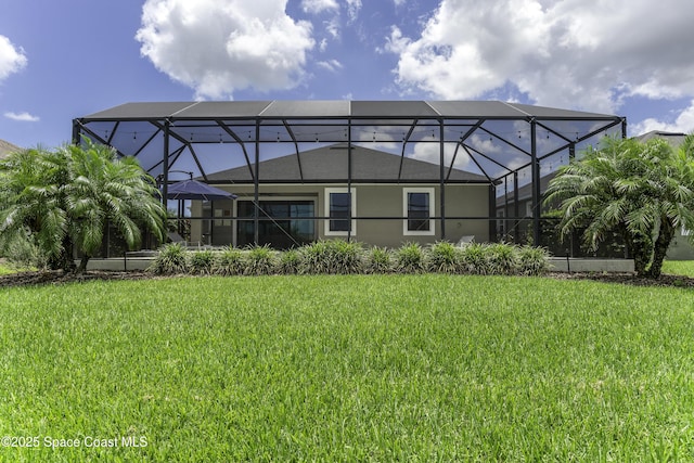 3975 Archdale St, Melbourne, FL 32940 - rear view of house with a yard and glass enclosure