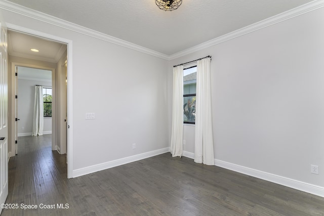 3975 Archdale St, Melbourne, FL 32940 - empty room featuring dark wood-style floors and crown molding