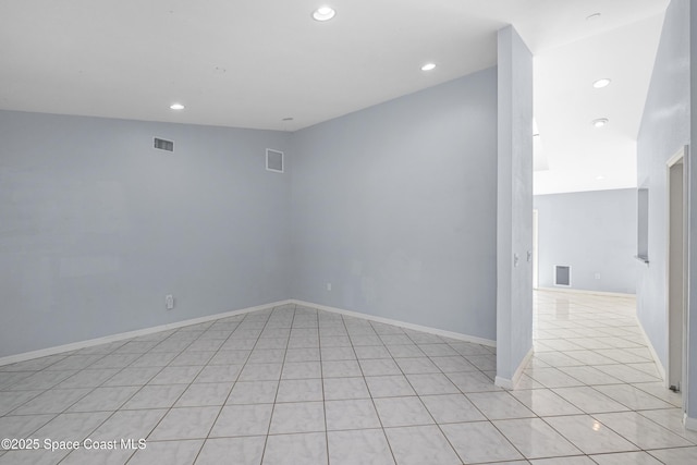 2749 Digby Rd SE, Palm Bay, FL 32909 - spare room with light tile patterned flooring and recessed lighting