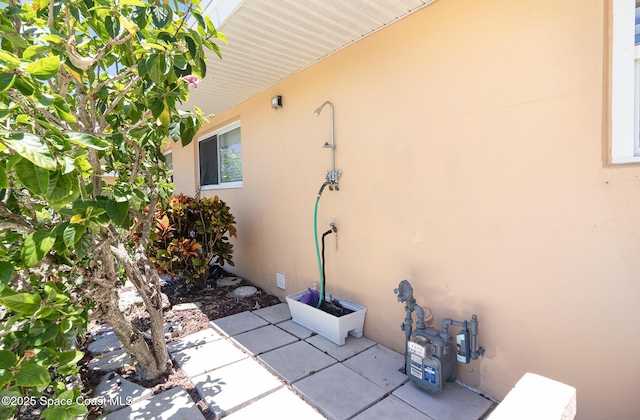 714 Catalina Rd Unit 2, Cocoa Beach, FL 32931 - view of side of home with stucco siding
