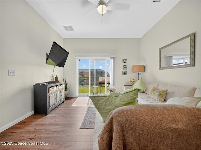 4086 Meander Pl Unit 104, Rockledge, FL 32955 - living room featuring wood finished floors and ceiling fan