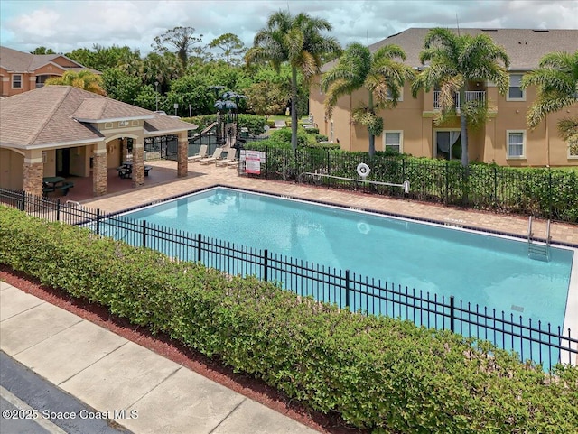 4086 Meander Pl Unit 104, Rockledge, FL 32955 - community pool featuring a patio