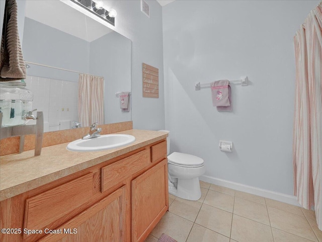 4086 Meander Pl Unit 104, Rockledge, FL 32955 - bathroom featuring vanity, tile patterned floors, and curtained shower
