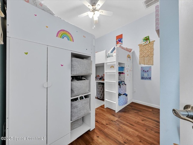 4086 Meander Pl Unit 104, Rockledge, FL 32955 - bedroom featuring wood finished floors and ceiling fan