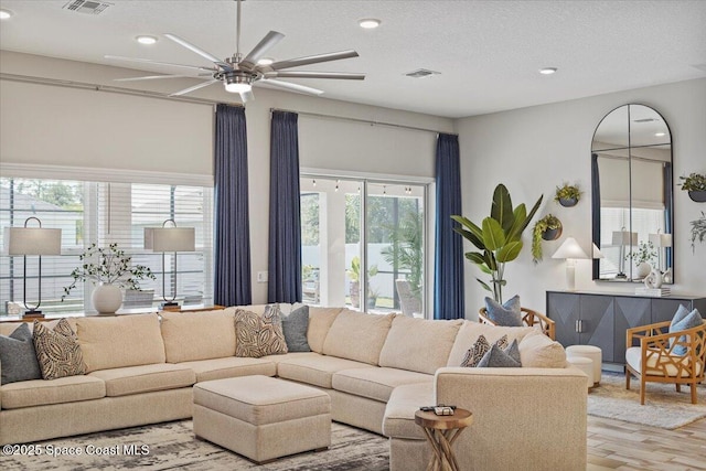 4692 Shannock Ave, Merritt Island, FL 32953 - living room with ceiling fan and recessed lighting