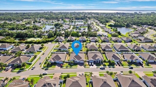 4692 Shannock Ave, Merritt Island, FL 32953 - aerial overview of property's location with nearby suburban area and a nearby body of water