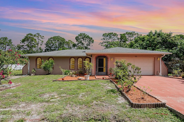 755 Haftez St NE, Palm Bay, FL 32907 - single story home featuring a garage, stucco siding, concrete driveway, and a front lawn